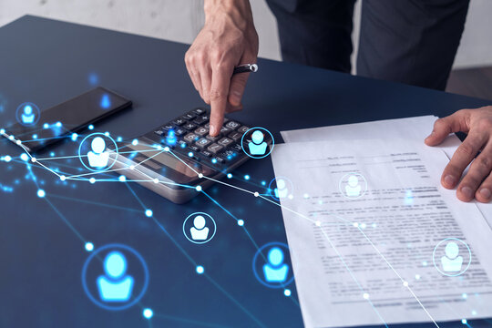 HR specialist researching and analyzing the data of salary on employment market to forecast ongoing expenses of the company using calculator. Hiring new talented officers. Social media hologram icons