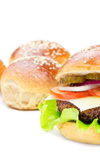 Cheeseburger isolated on a white background. Hamburger with cheese. Burger isolated. Copy space. Tasty dinner. Vertical orientation