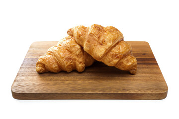 plain croissants on cutting wood board on white background