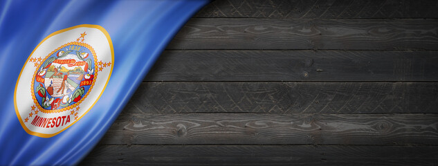 Minnesota flag on black wood wall banner, USA