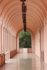 corridor with arches and columns