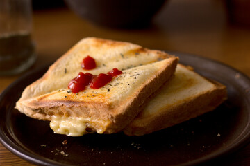 Toast with ketchup and cheese