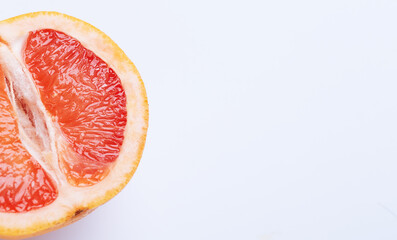 Half grapefruit on white background