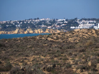 Beuatiful skyline of Armacaou de Pera with dunes in Portugal