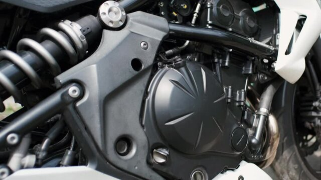 Classic motorbike in garage. Close-up of motorcycle engine and over details
