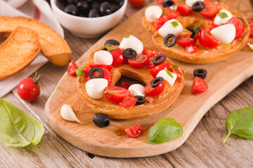 Friselle with tomatoes and mozzarella cheese.