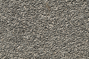 Tekstura asfaltu lokalnej drogi.