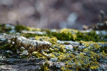 Metal tiger figurine close-up. The symbol of 2022.