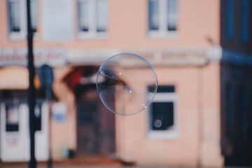 soap bubbles on the background of city buildings