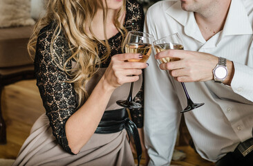 young people with a glass of champagne, lovers drink champagne, glasses with champagne 