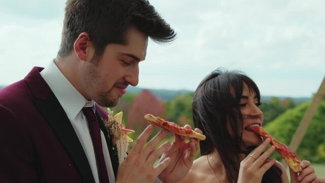 Models Pretending To Eat Pizza At Wedding Fashion Shoot, Slow Motion Closeup