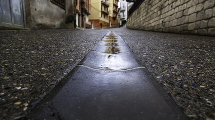 Old alley under the rain