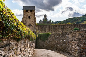 View on the castle in cochem from a walled aisle in old town