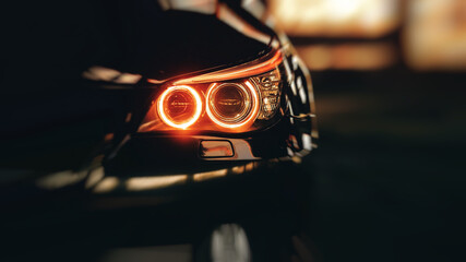 Headlights of black modern car close up. Modern luxury car close-up banner background. Concept of...