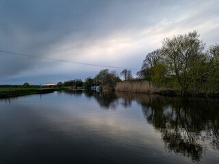 reflection of trees on the river