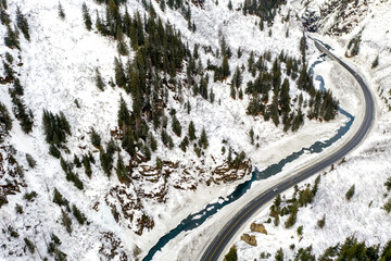 Aerial view of the Richardson Highway, Keystone Canyon, and Lowe River near Valdez, Alaska during the winter.