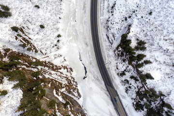 Aerial view of the Richardson Highway, Keystone Canyon, and Lowe River near Valdez, Alaska during the winter.