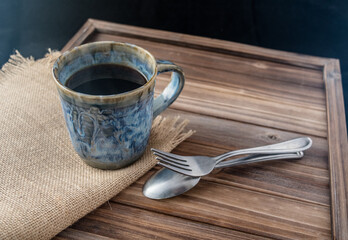 Coffee cup and burlap