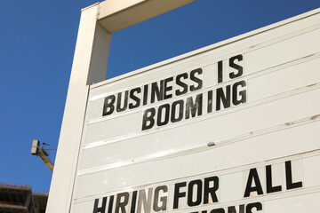 Business is booming sign 1