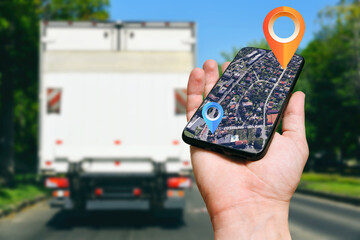 Hand with map and navigation. Search for delivery address. Delivery concept.