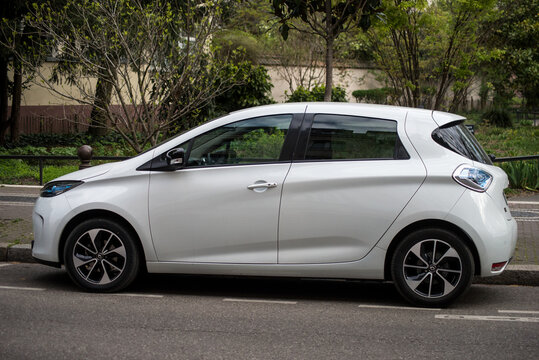 Mulhouse - France - 11 April 2021 - Profile view of white Renault Zoe electric car parked in the street
