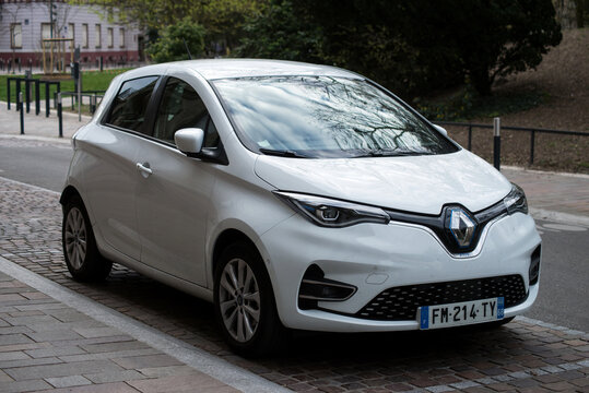 Mulhouse - France - 11 April 2021 - Front view of white Renault Zoe electric car parked in the street
