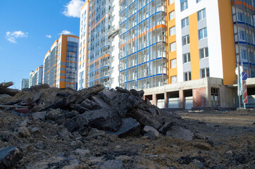 houses under construction and debris