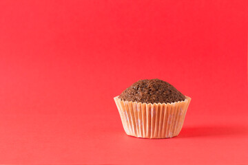 homemade muffin on a red background