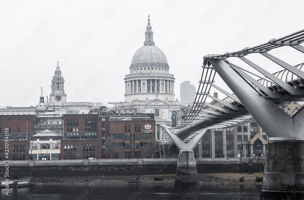 Sticker city of london and st. pauls cathedral in raining, misty day view from the river thames. empty stree