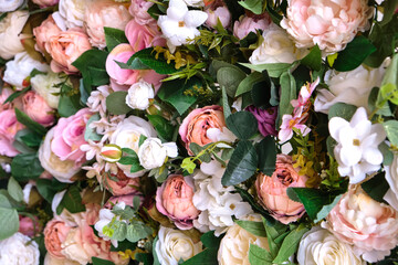 background of multicolored beautiful cloth artificial flowers