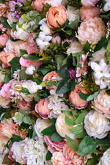 Obraz na płótnie Canvas background of multicolored beautiful cloth artificial flowers