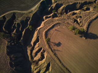 drone photo of flight above the fields and canyons
