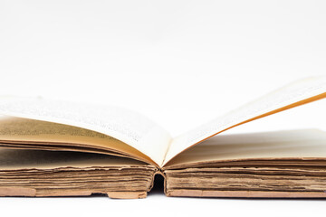 Antique open book isolated with flipping pages on white background