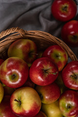  Fresh red apple fruits in a basket.Top view.