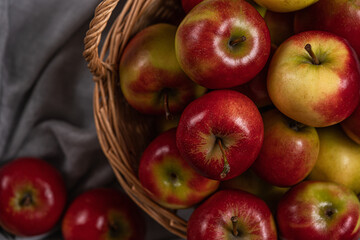  Fresh red apple fruits in a basket.Top view.