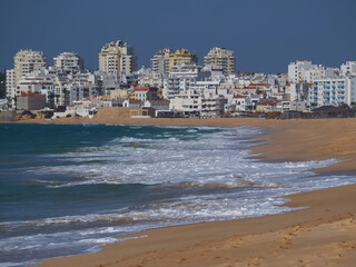 Beuatiful skyline of Armacaou de Pera with dunes in Portugal