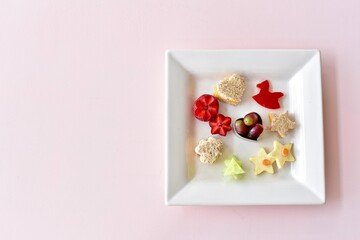 Fun kids food creatively arranged to entice healthy eating for children's meals. Photo concept, creative food, background, copy space