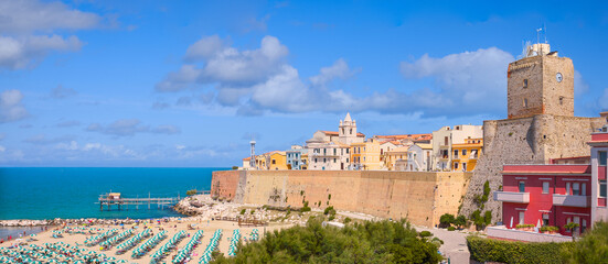 Panoramic view of the old town of Termoli with the defensive walls, the colorful houses and Svevo Castle, Termoli, Italy - obrazy, fototapety, plakaty