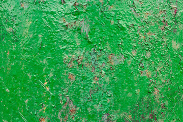 Metal painted green with oil paint background texture 