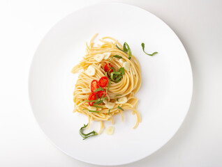 Italian pasta with garlic and chili peppers 