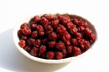 Star gooseberry in syrup in bowl