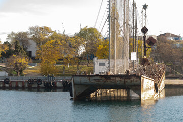 Sea target for artillery shooting. Sea barge for practicing shooting at a mooring in the bay.