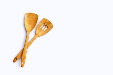Wooden kitchen spatula on white background.