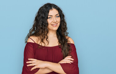 Obraz premium Young hispanic girl wearing casual clothes happy face smiling with crossed arms looking at the camera. positive person.