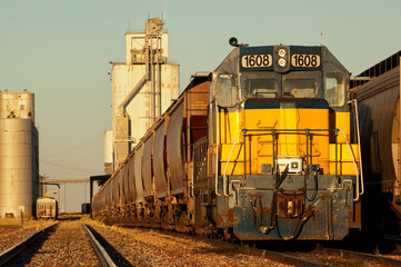 Freight train hauling grain from grain elevators;  Venango, Nebraska