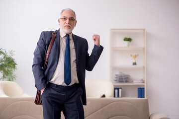 Old businessman employee waiting for business meeting