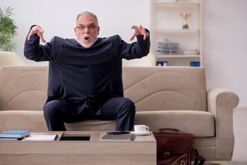 Old businessman employee waiting for business meeting