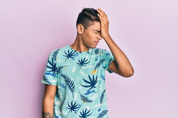 Young handsome african american man wearing summer style surprised with hand on head for mistake,...