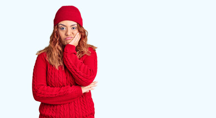 Young latin woman wearing casual clothes thinking looking tired and bored with depression problems with crossed arms.