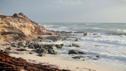 Fototapeta na wymiar Rocky Beach Coastline with Wild Ocean Waves